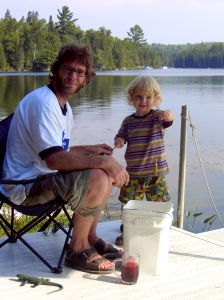 Rain and his Daddy fishing at camp